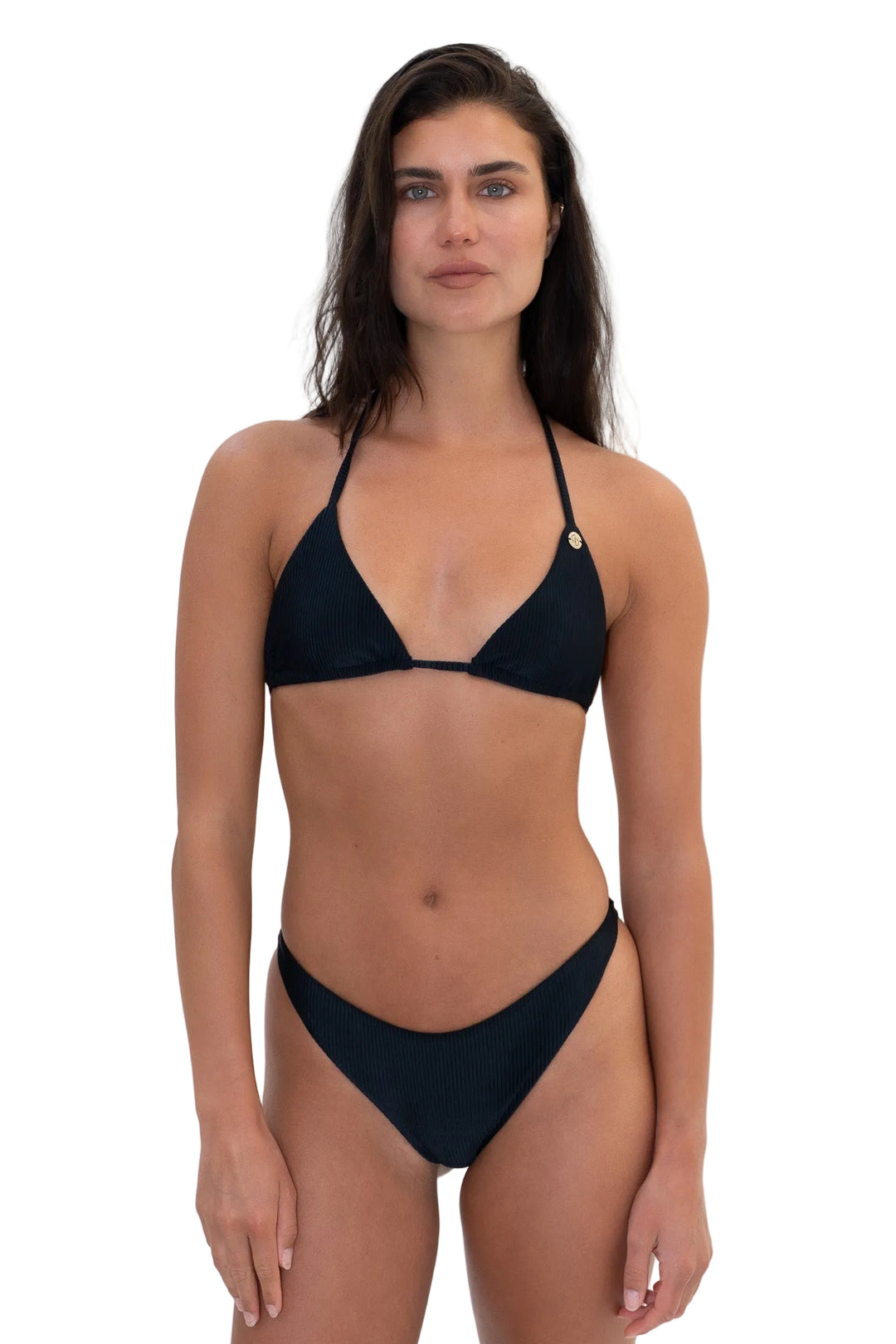 Model wearing the KALLINA black ribbed triangle bikini top paired with matching black MAIU bikini bottoms by Almaya Swimwear.