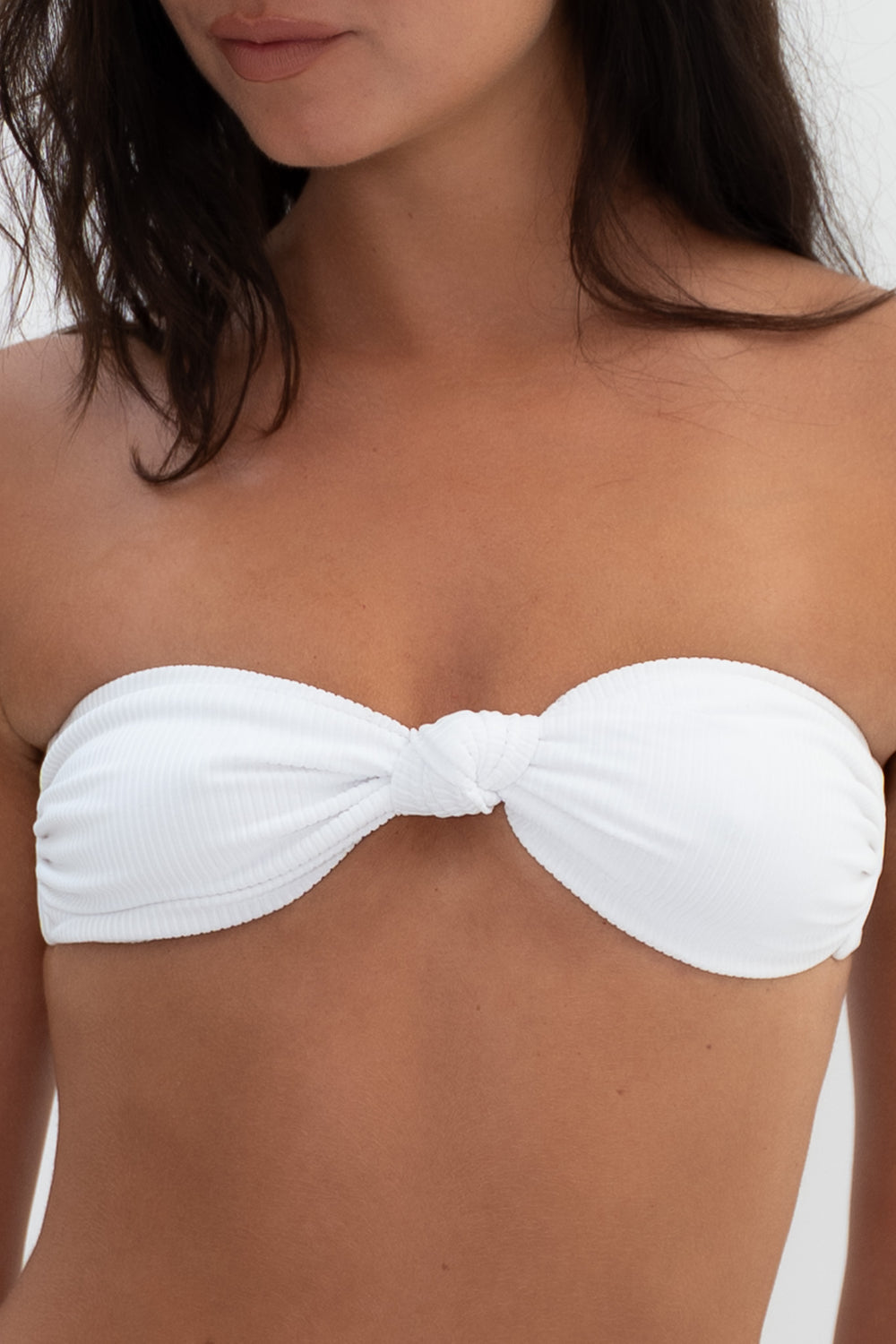 KAYA white ribbed strapless bandeau bikini top with knotted front detail and removable padding.